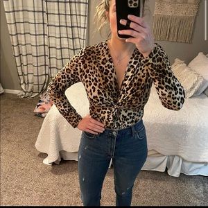NWT. Cheetah print bodysuit